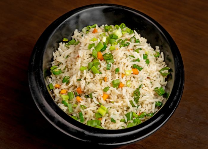 O que vai no arroz temperado
